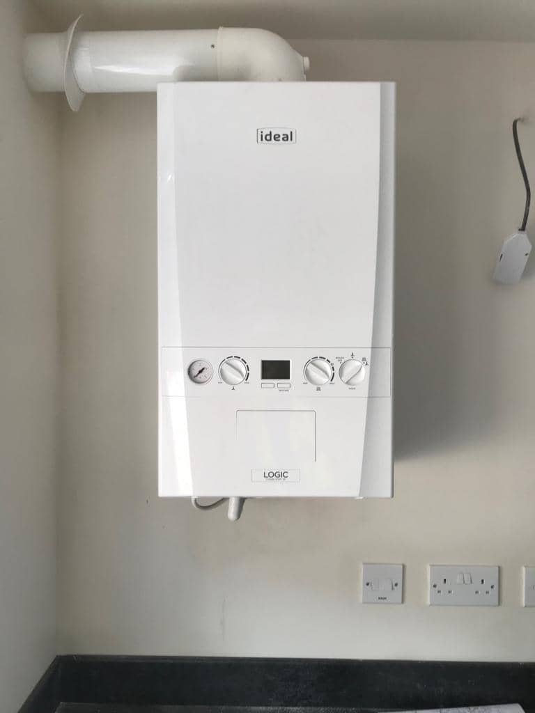 First fix installation for a kitchen including combi boiler